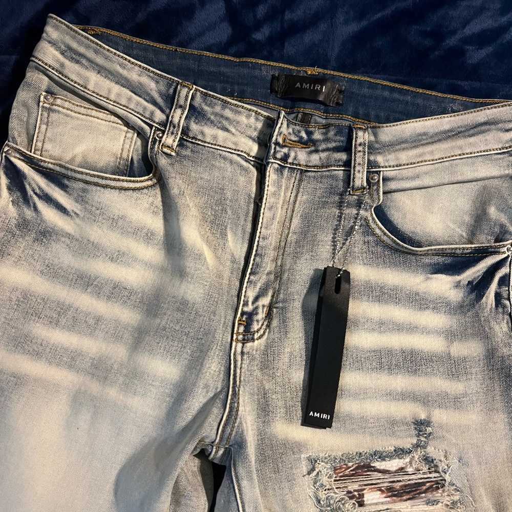Light Blue Distressed Amiri Jeans